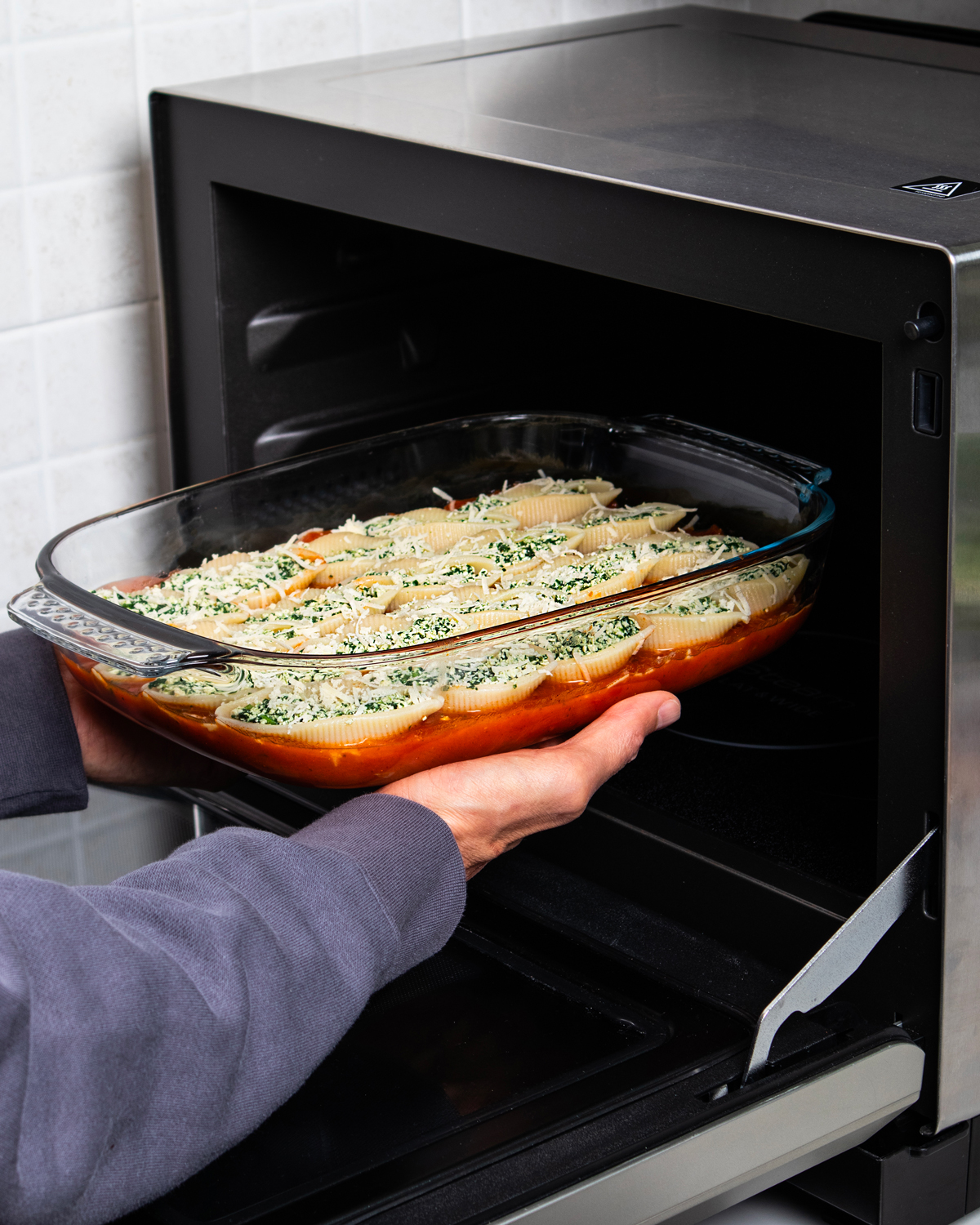 Conchiglioni con tofu e spinaci al forno